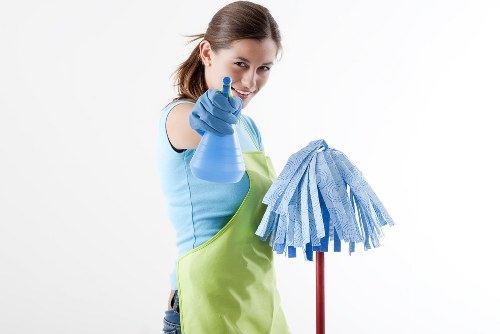 Cleaning staff reviewing ethical labour standards in a workplace