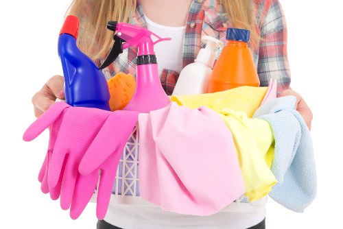 Professional cleaners restoring a property after renovation