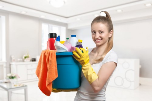Supervisor reviewing cleaning risk assessments and safety checks