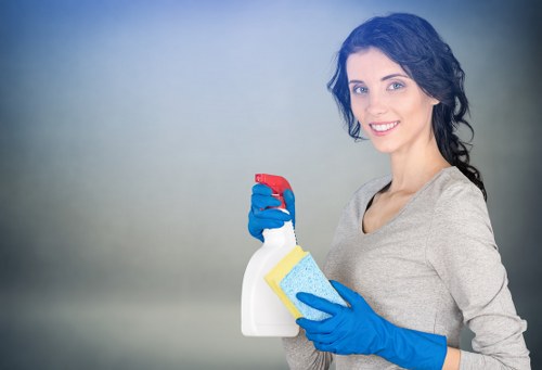 Local carpet cleaner in Lambeth removing stains from a hallway carpet